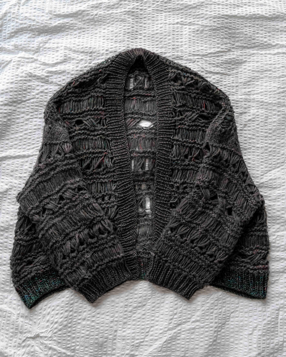 Cloudfall Cardigan knitting kit in Soot and Cassiopeia