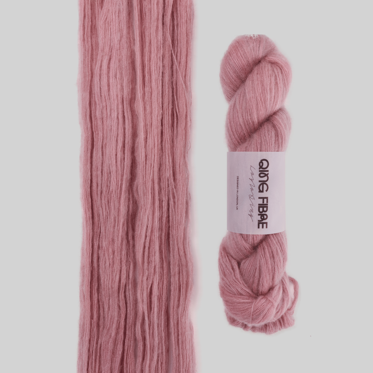 Veranita Soft Clay yarn, with an open skein and twisted skein on a grey background