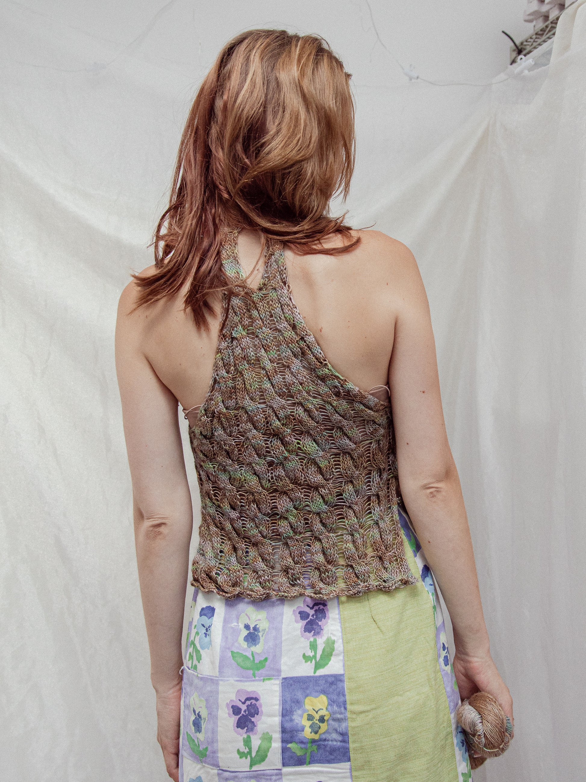 Back view of the Heligan Halterneck knitted in REM Yak Single