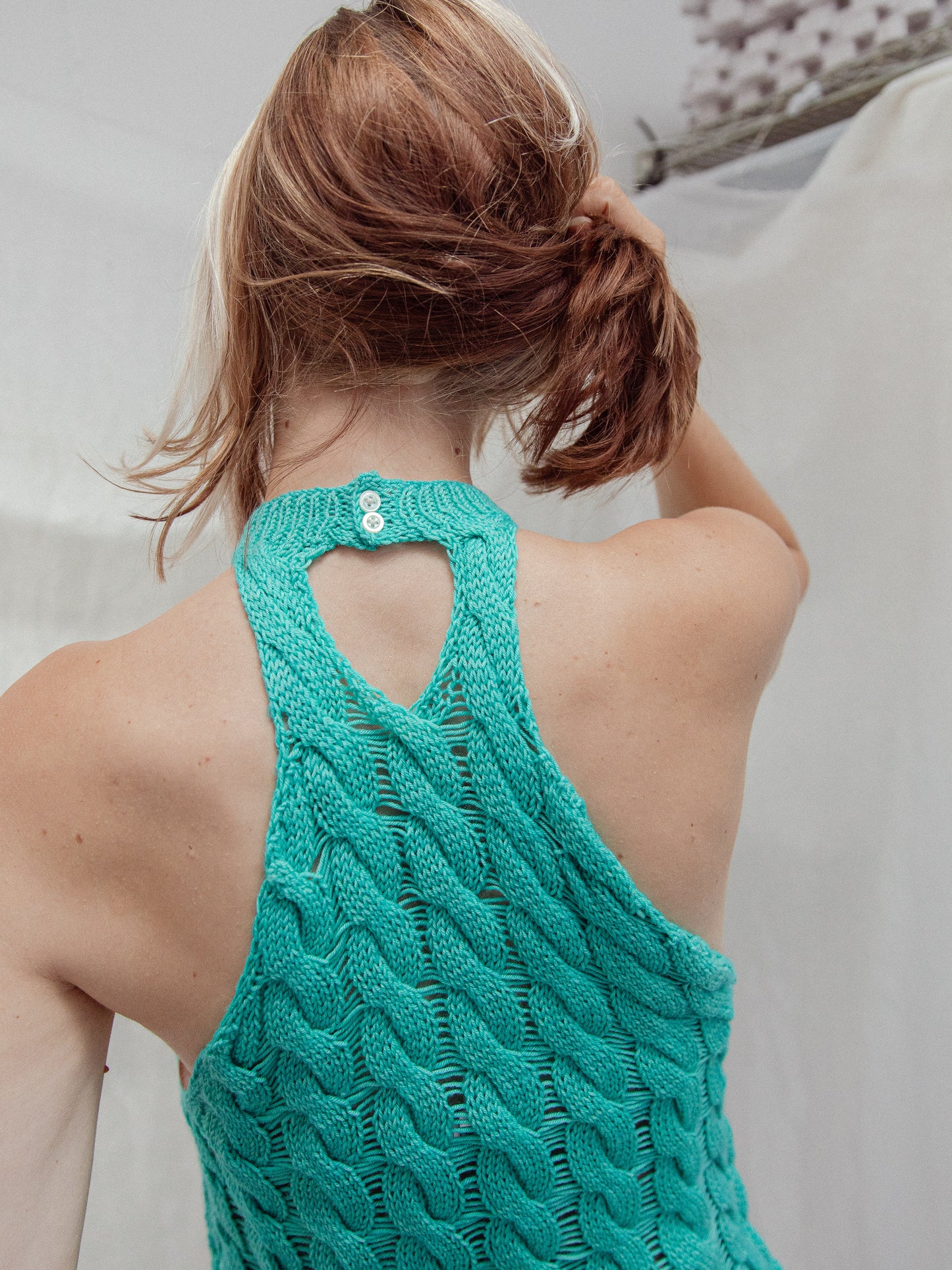 Back neck and cable detail of the Heligan Halterneck in Furby