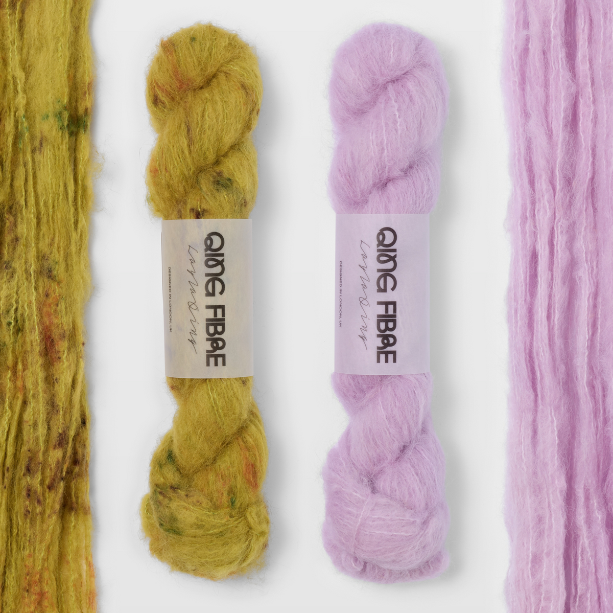 Guardian and Thistle Melted Baby Suri 25g yarn, with two twisted skeins between the open skeins on a grey background.