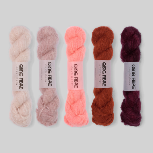Rose to Wine Suri 25g fade set: Dust, Soft Clay, Shrimp, All Hallows and Hush twisted skeins arranged from pale blush through coral and rust to deep wine.